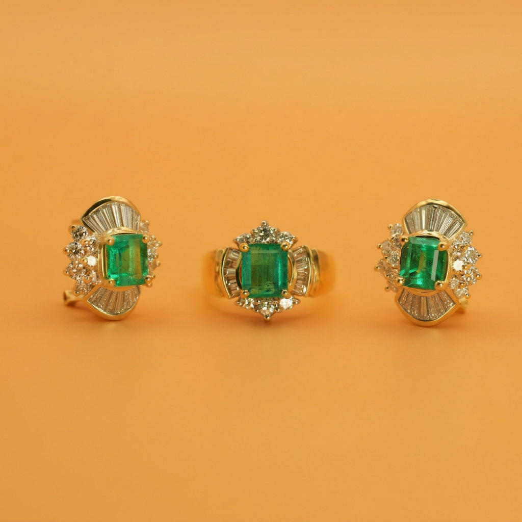 Emerald and diamond ring and earrings suite in 18K yellow gold