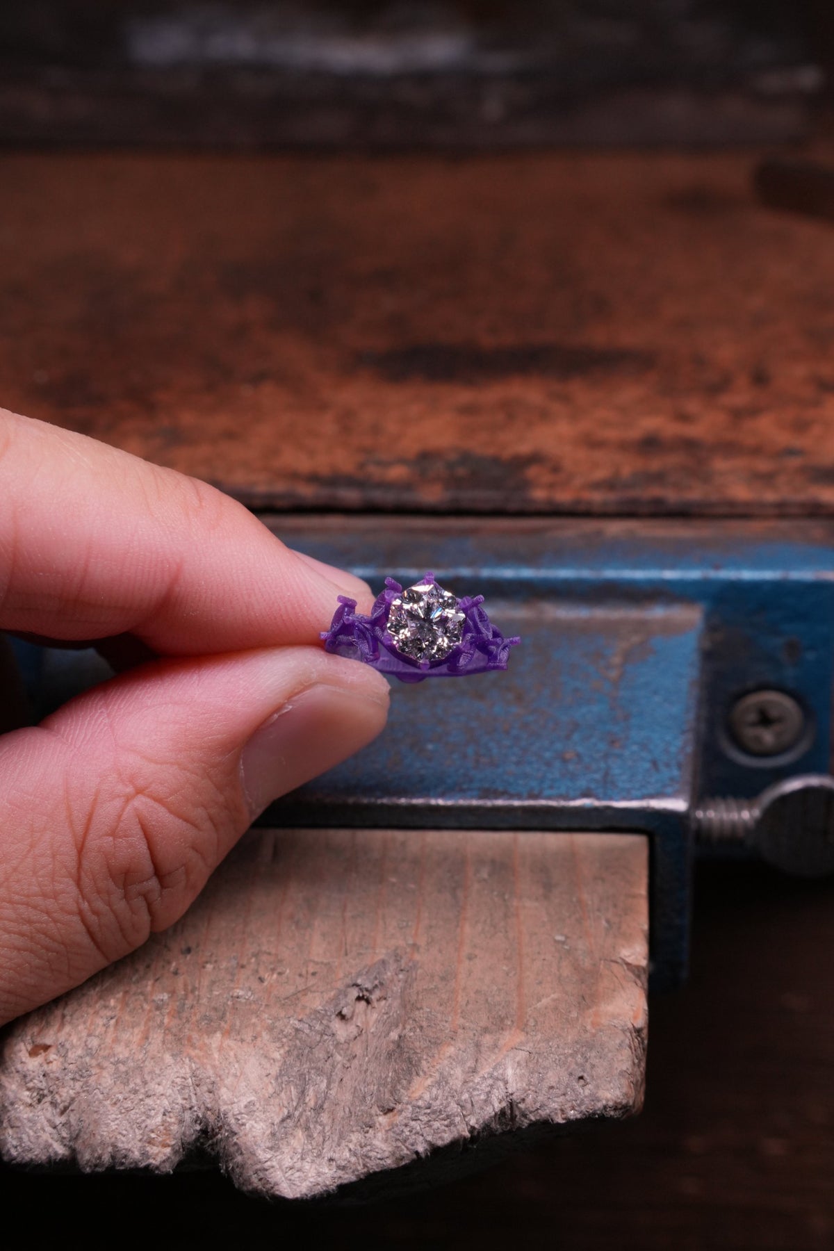 Sakura cut diamond test-fitted in a 3D printed model of a floral engagement ring