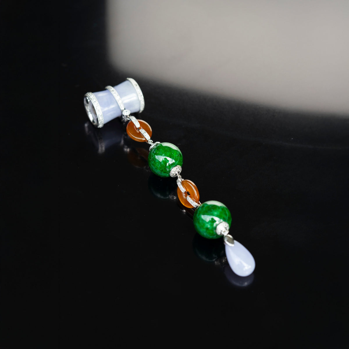 Three-color lavender, orange and green jadeite dangle pendant with diamonds in 18K white gold
