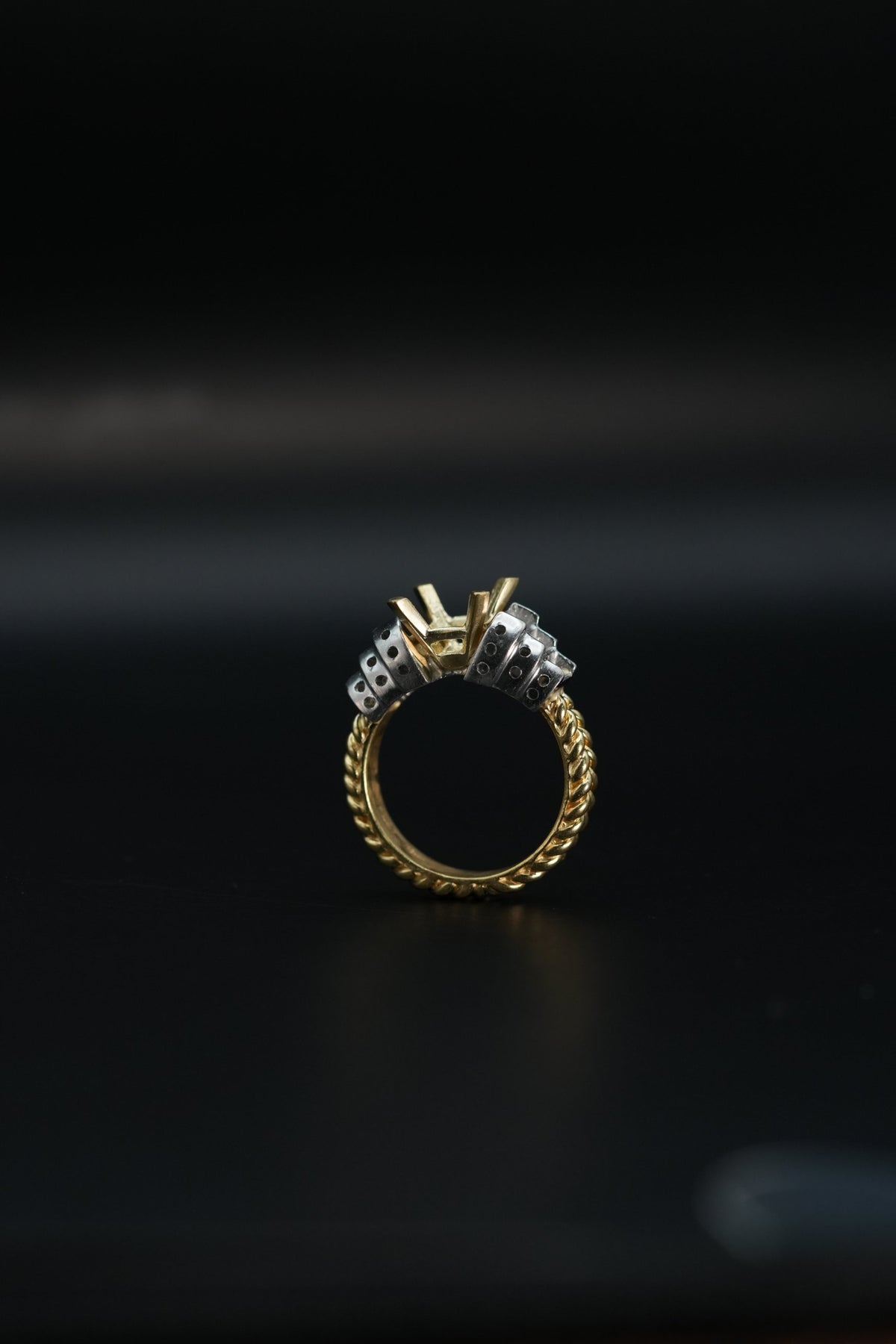 Two-tone ring mounting with twisted yellow gold shank and platinum shoulders